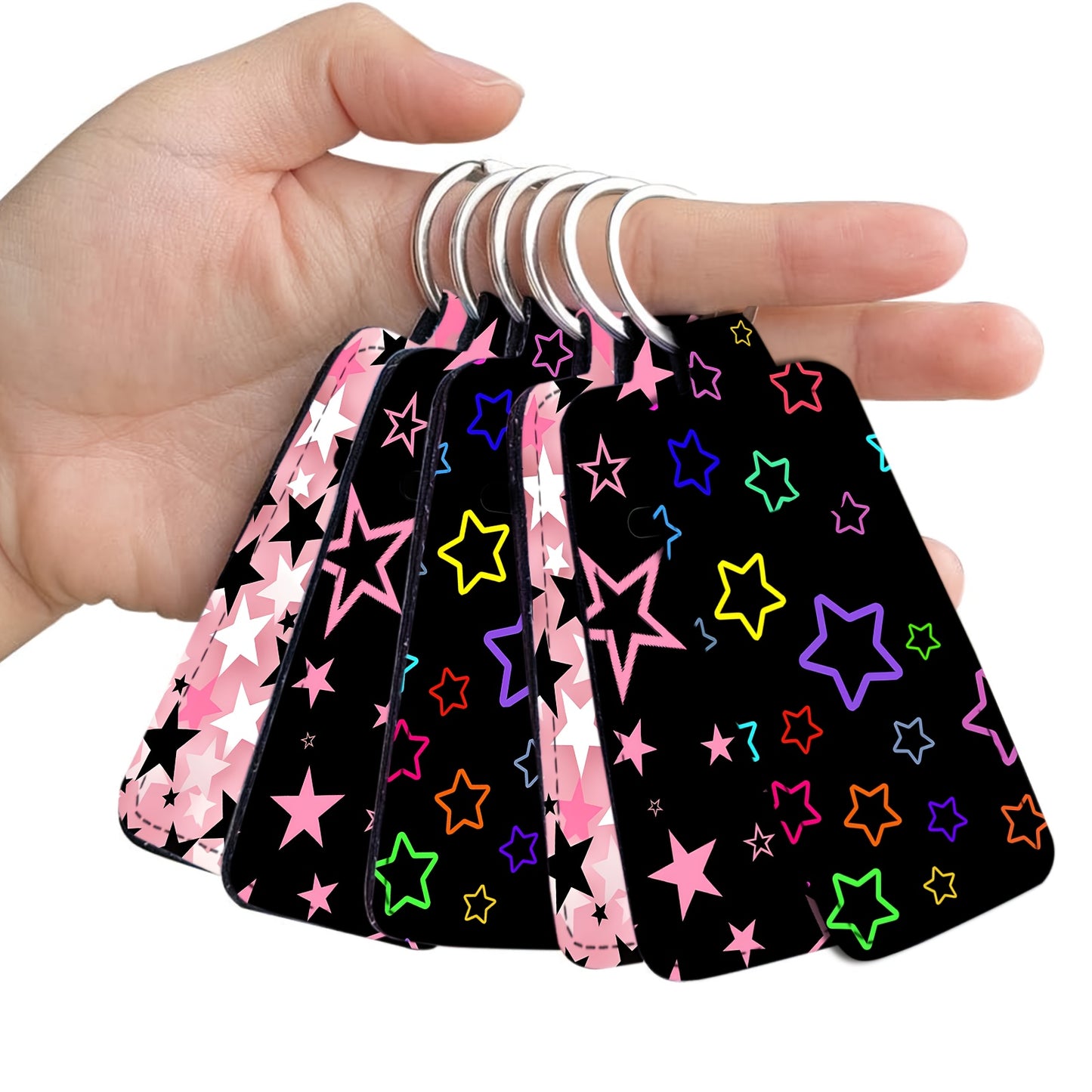 Colorful Stars on black background Lip balm holder keychain