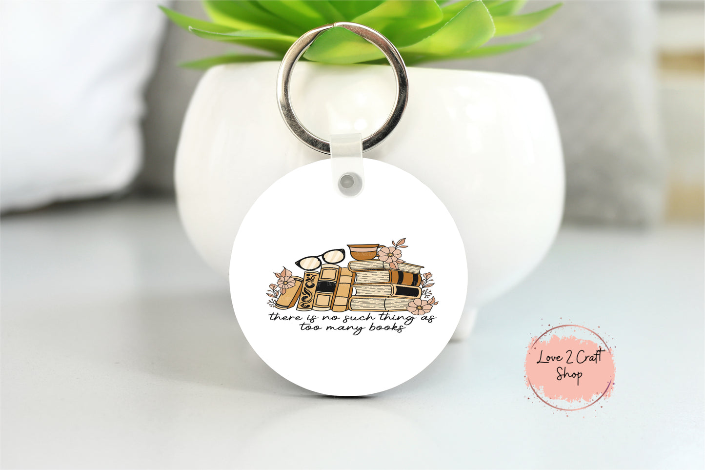 There is no such thing as too many books Key chain