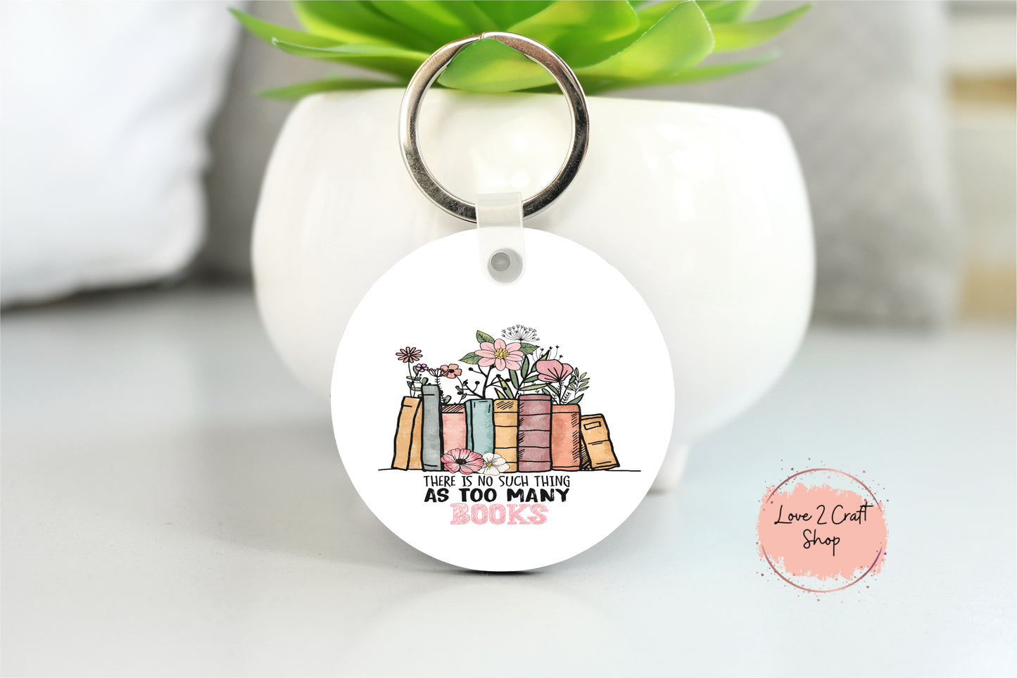 There is no such thing as too many books Key chain