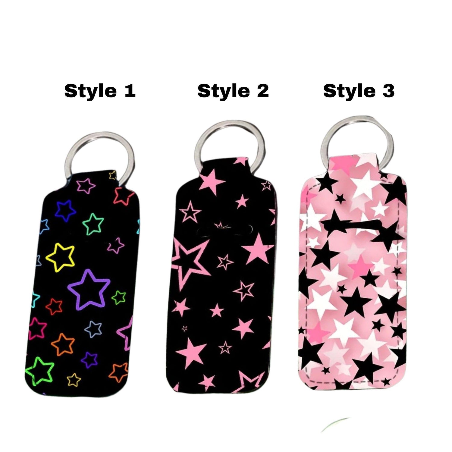 Colorful Stars on black background Lip balm holder keychain