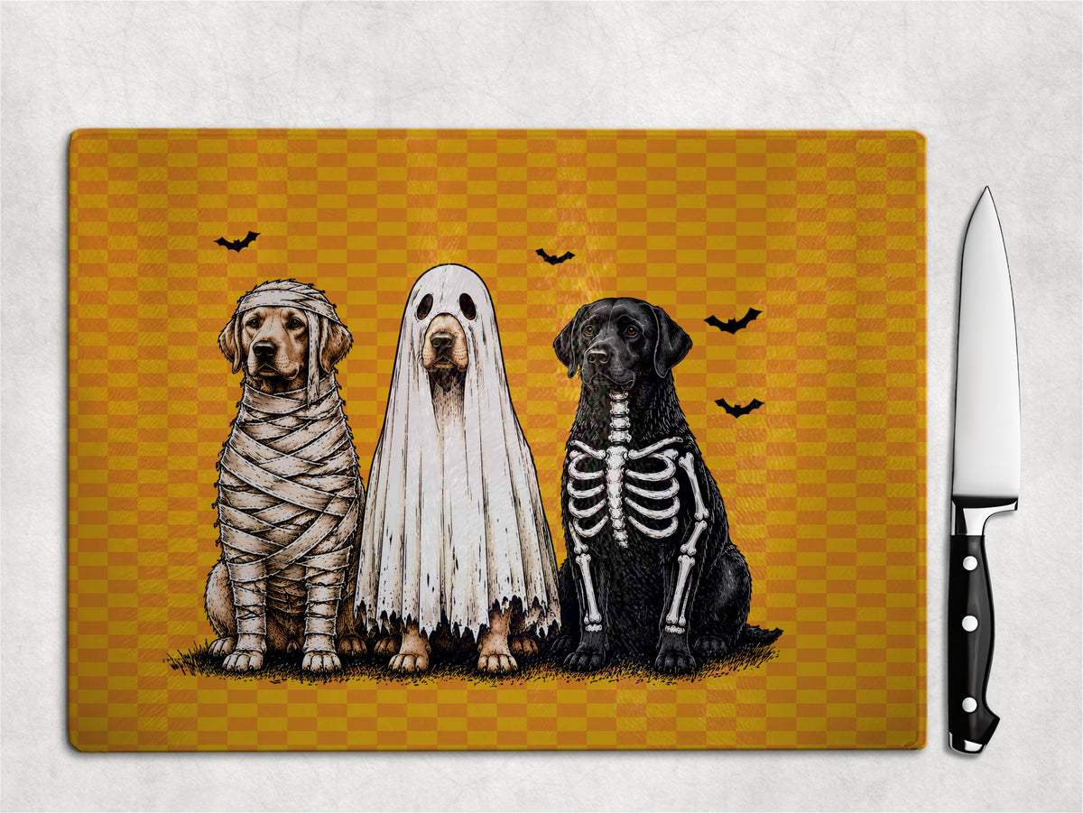 Adorable spooky halloween dogs Glass Cutting Board